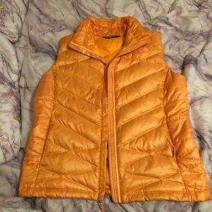 The North Face orange vest